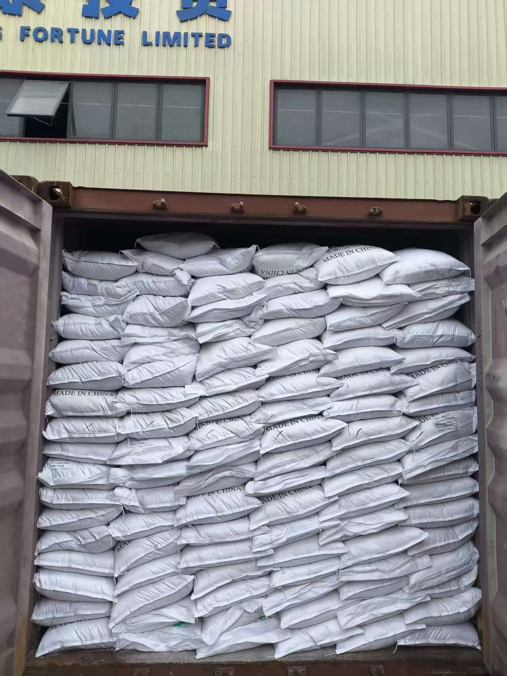 Container loaded with MDCP 25 kg bags for export
